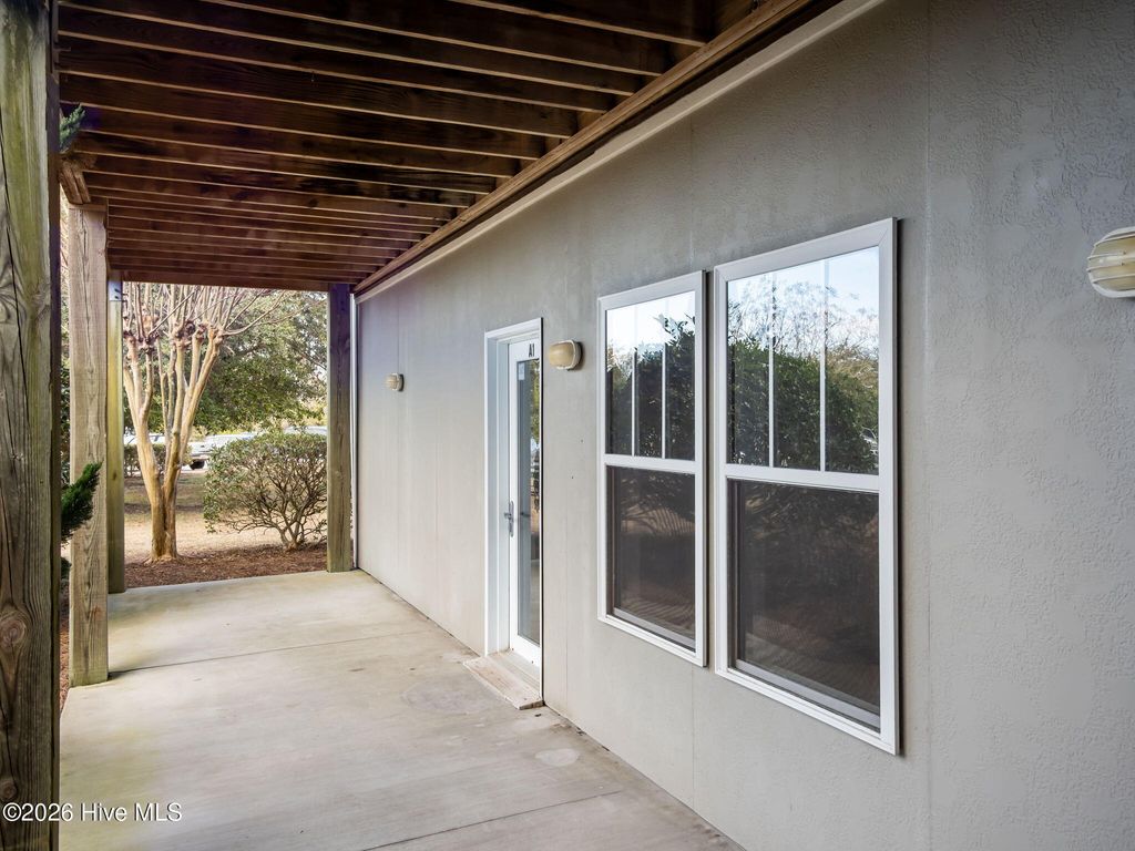 Photo of 200 Lighthouse Lane #A1, Cedar Point, NC 28584 (MLS # 100549681)