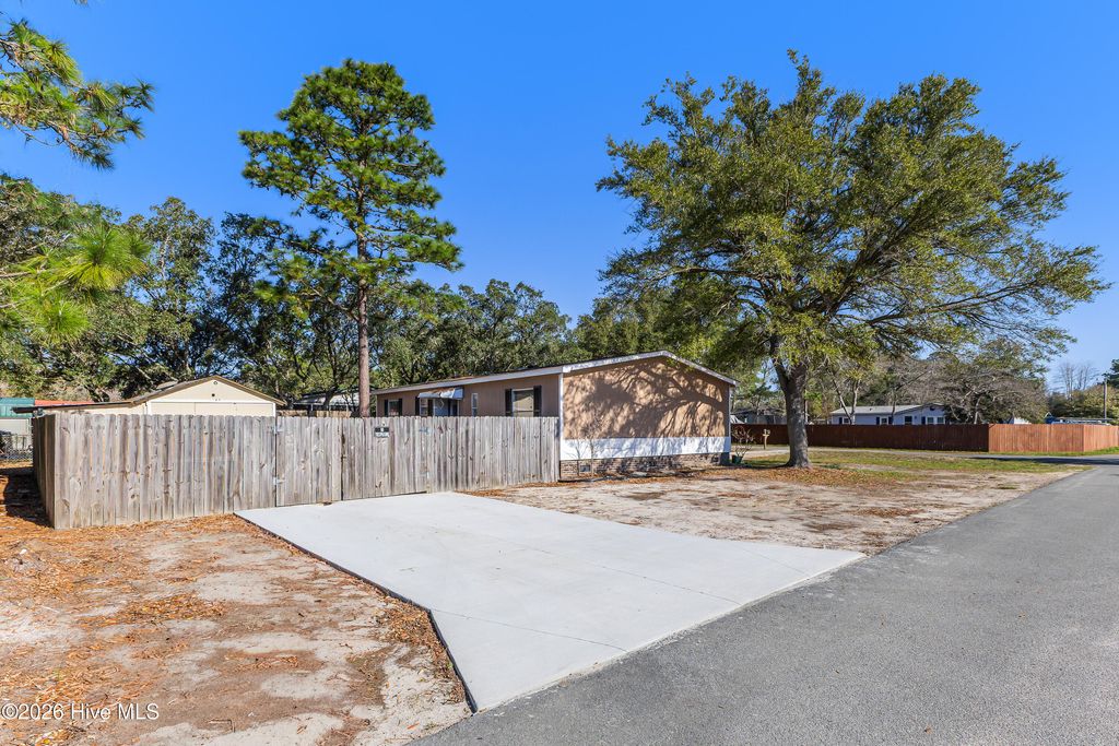 Photo of 4690 Port Loop Road SE, Southport, NC 28461 (MLS # 100564179)