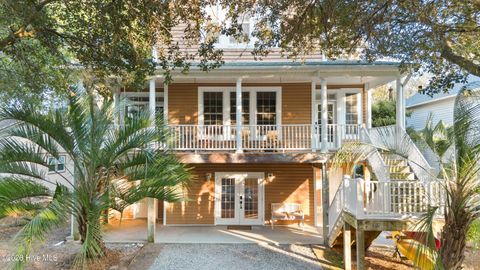 Photo of 118 SW 2nd Street, Oak Island, NC 28465 (MLS # 100549187)