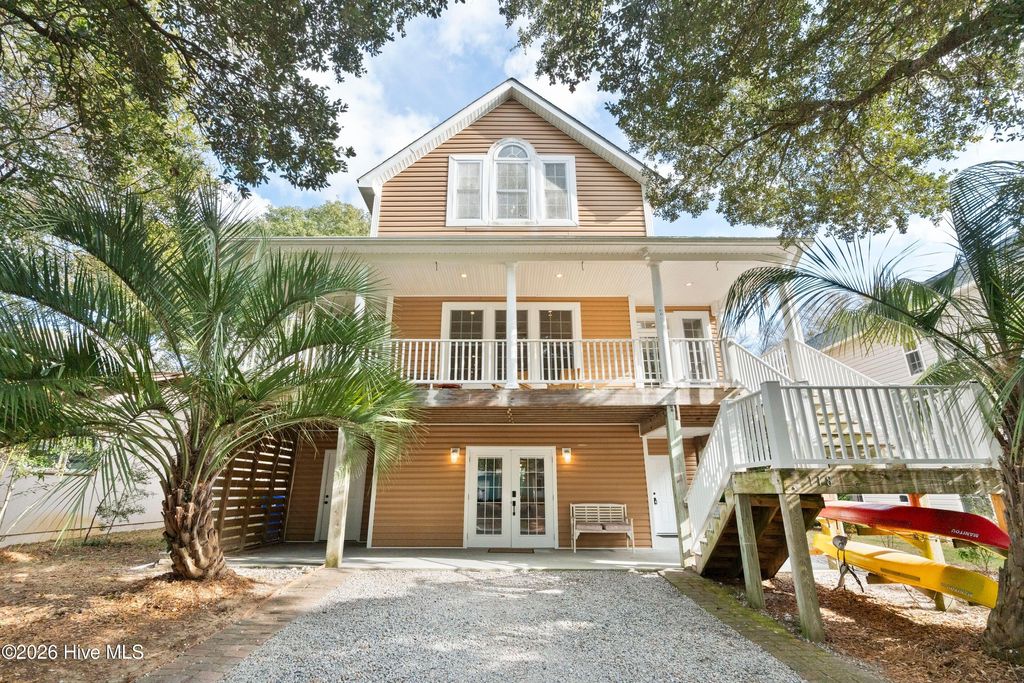 Photo of 118 SW 2nd Street, Oak Island, NC 28465 (MLS # 100549187)