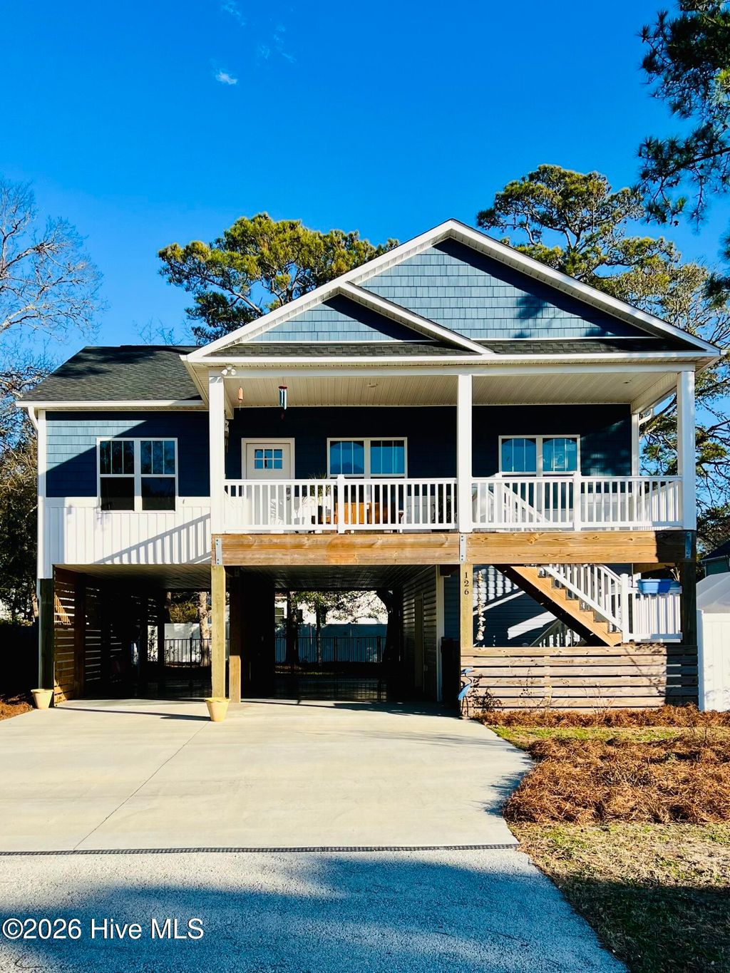 Photo of 126 NW 18th Street, Oak Island, NC 28465 (MLS # 100551731)