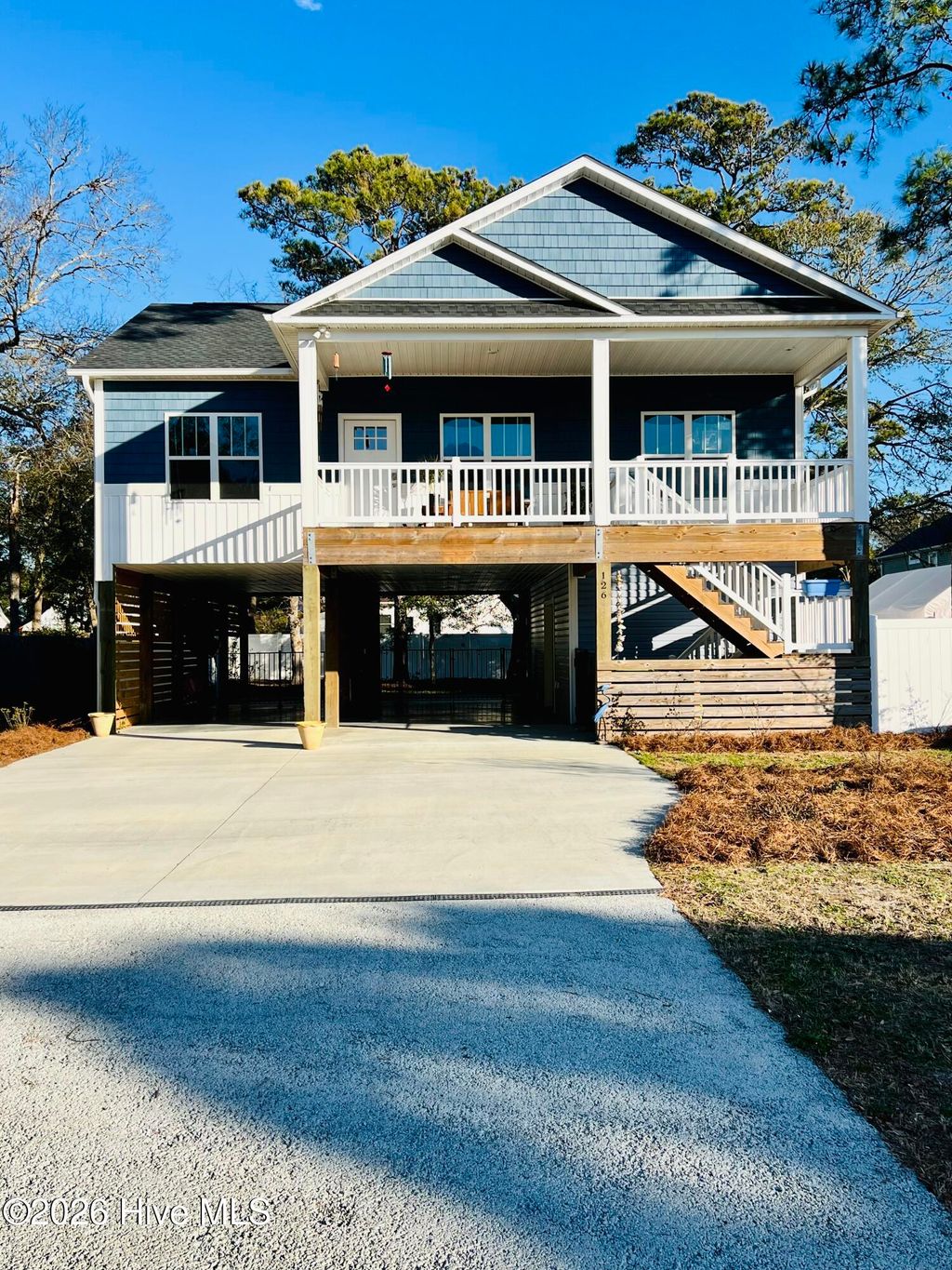 Photo of 126 NW 18th Street, Oak Island, NC 28465 (MLS # 100551731)