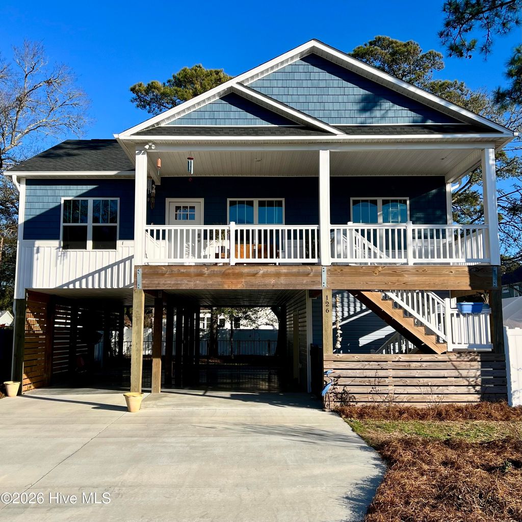 Photo of 126 NW 18th Street, Oak Island, NC 28465 (MLS # 100551731)