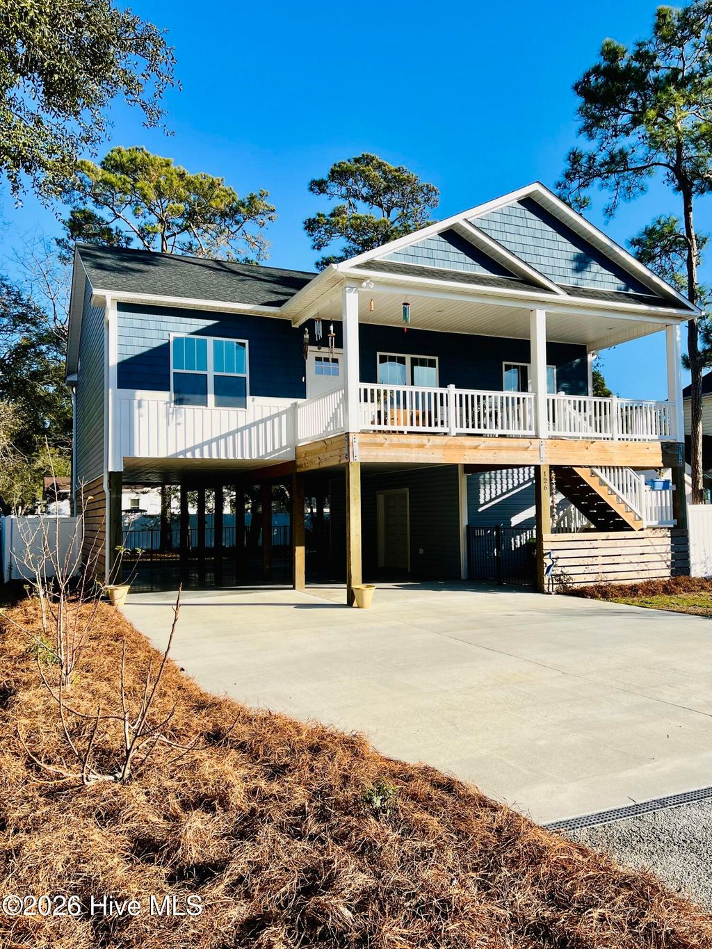 Photo of 126 NW 18th Street, Oak Island, NC 28465 (MLS # 100551731)