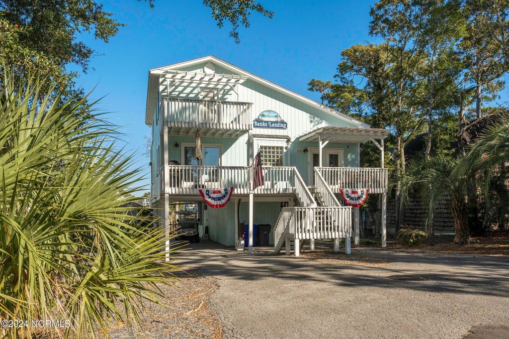 Photo of 3006 E Yacht Drive, Oak Island, NC 28465 (MLS # 100571470)