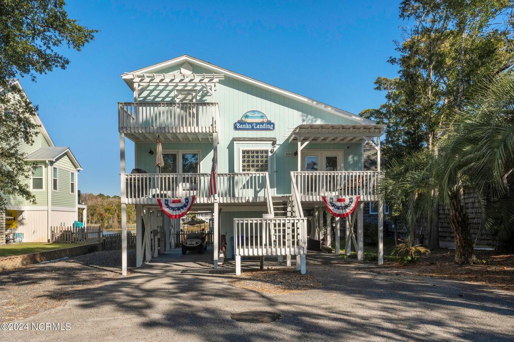 Photo of 3006 E Yacht Drive, Oak Island, NC 28465 (MLS # 100571470)