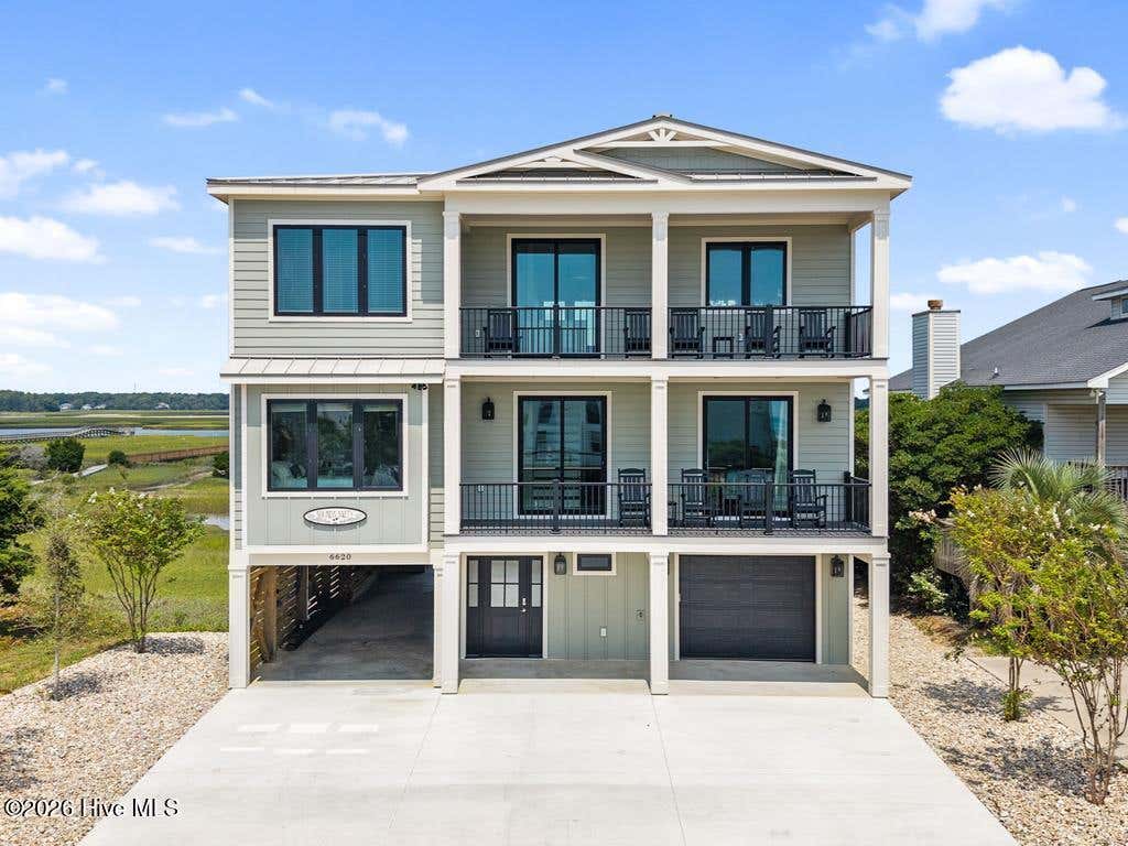 Photo of 6620 Kings Lynn Drive, Oak Island, NC 28465 (MLS # 100598262)
