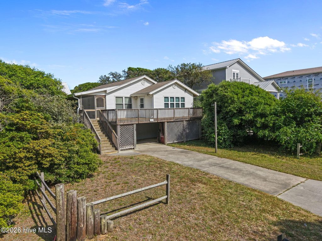 Photo of 212 SE 78th Street, Oak Island, NC 28465 (MLS # 100574730)