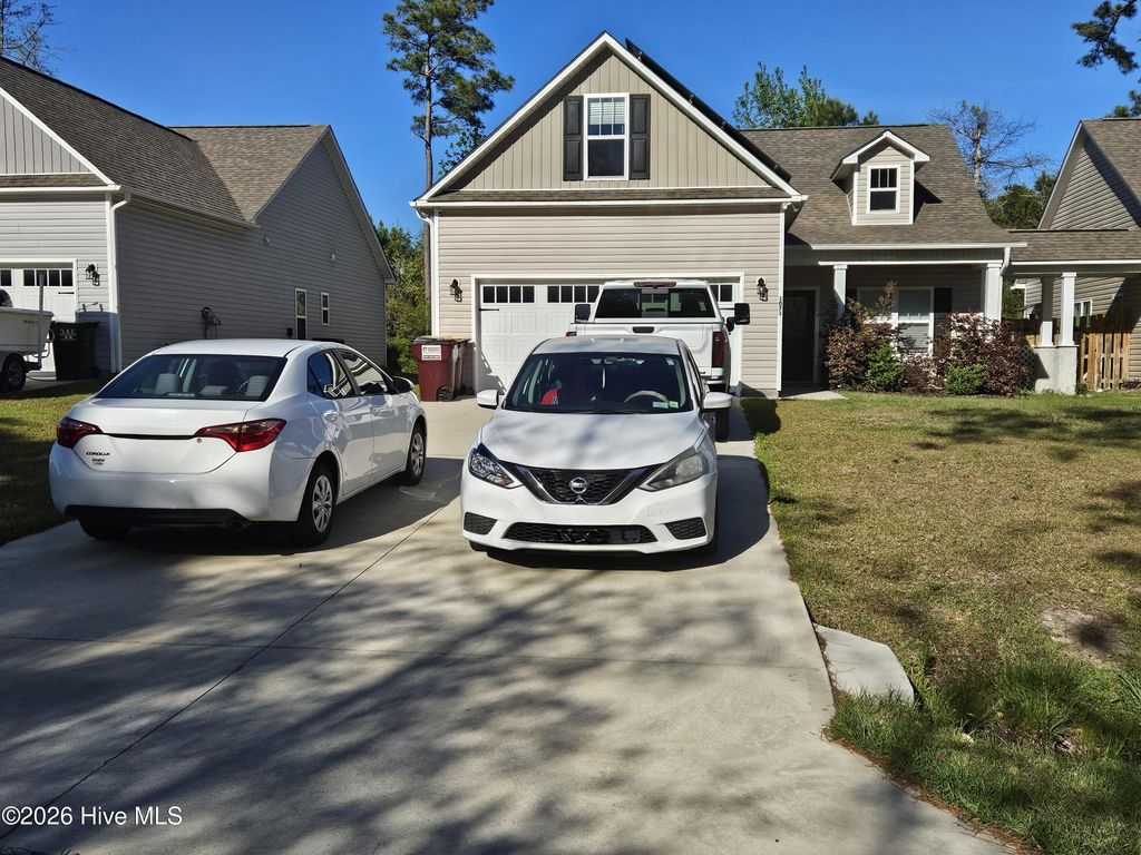 Photo of 1071 Dan Owen Drive, Hampstead, NC 28443 (MLS # 100568888)