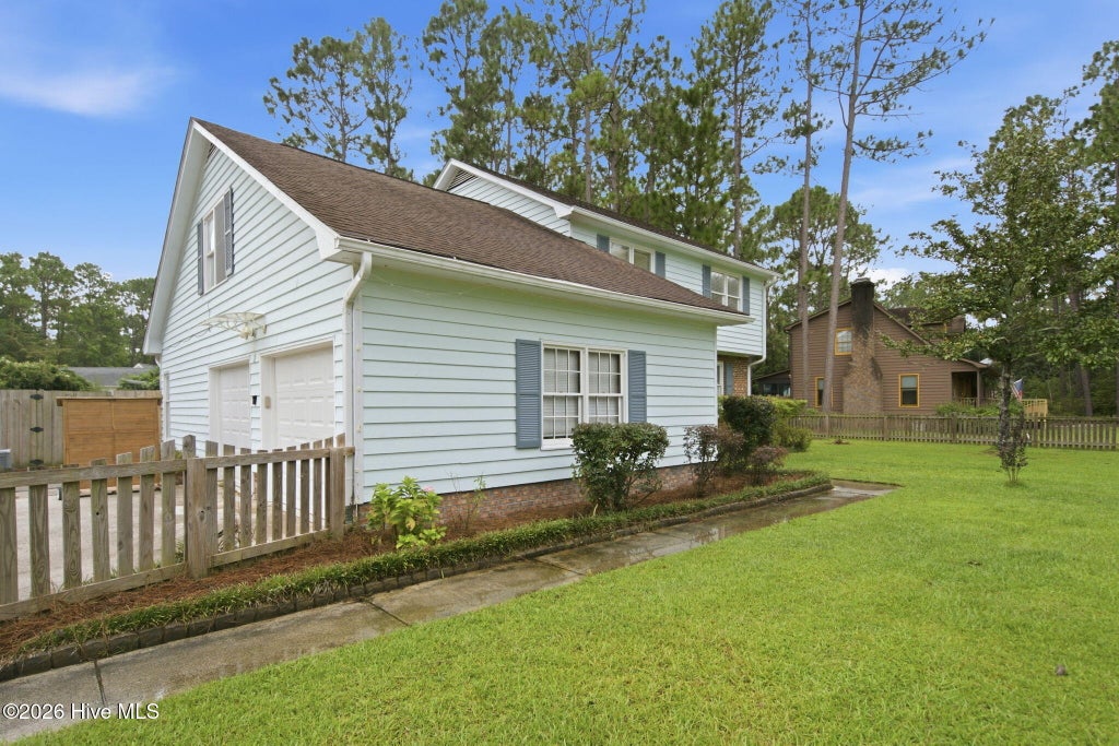 Photo of 10017 N Olde Towne Wynd SE, Belville, NC 28451 (MLS # 100600148)
