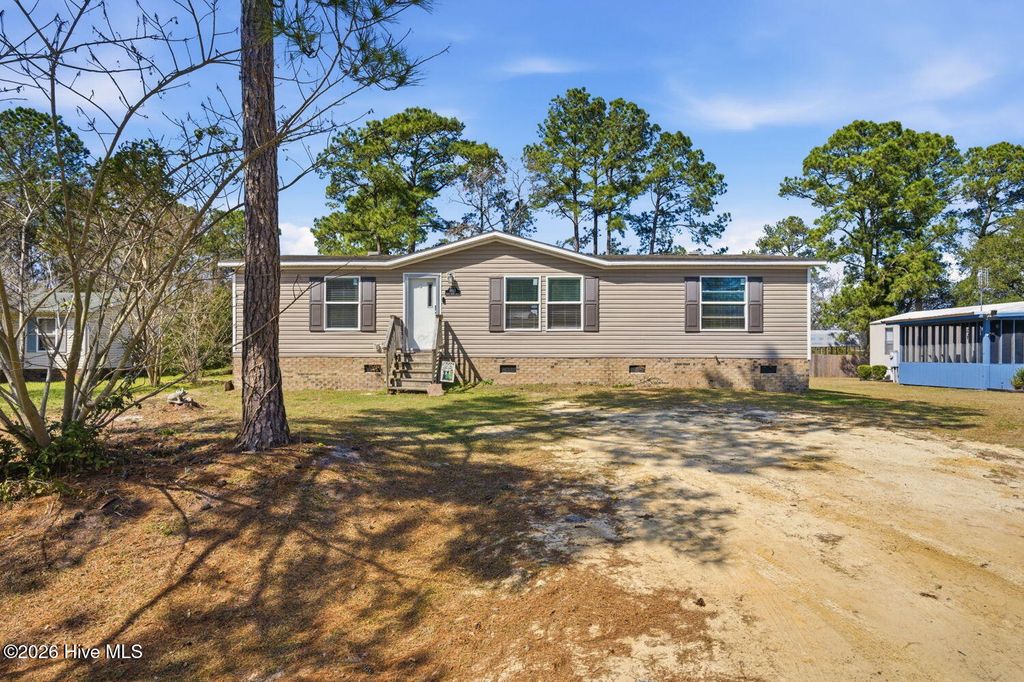 Photo of 5152 Green Heron Drive SW, Shallotte, NC 28470 (MLS # 100559177)