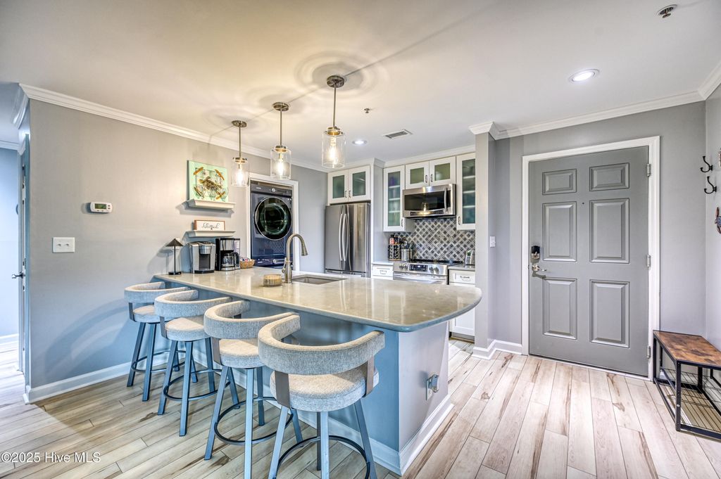 Photo of 790 New River Inlet Road #Unit 105a, North Topsail Beach, NC 28460 (MLS # 100536578)