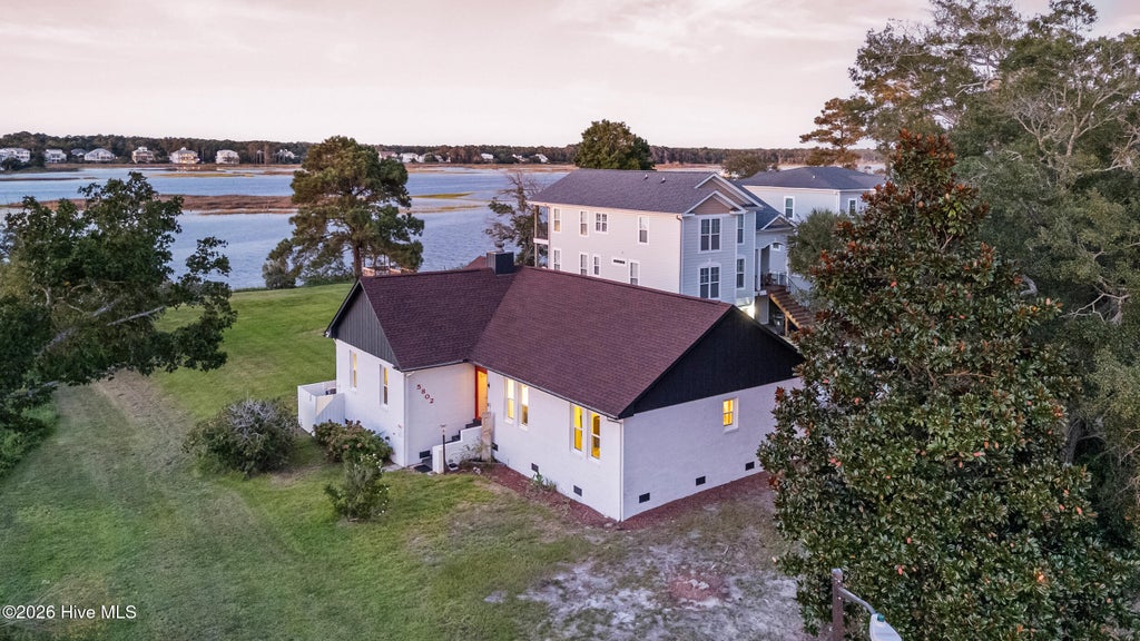 Photo of 5802 E Yacht Drive, Oak Island, NC 28465 (MLS # 100602289)