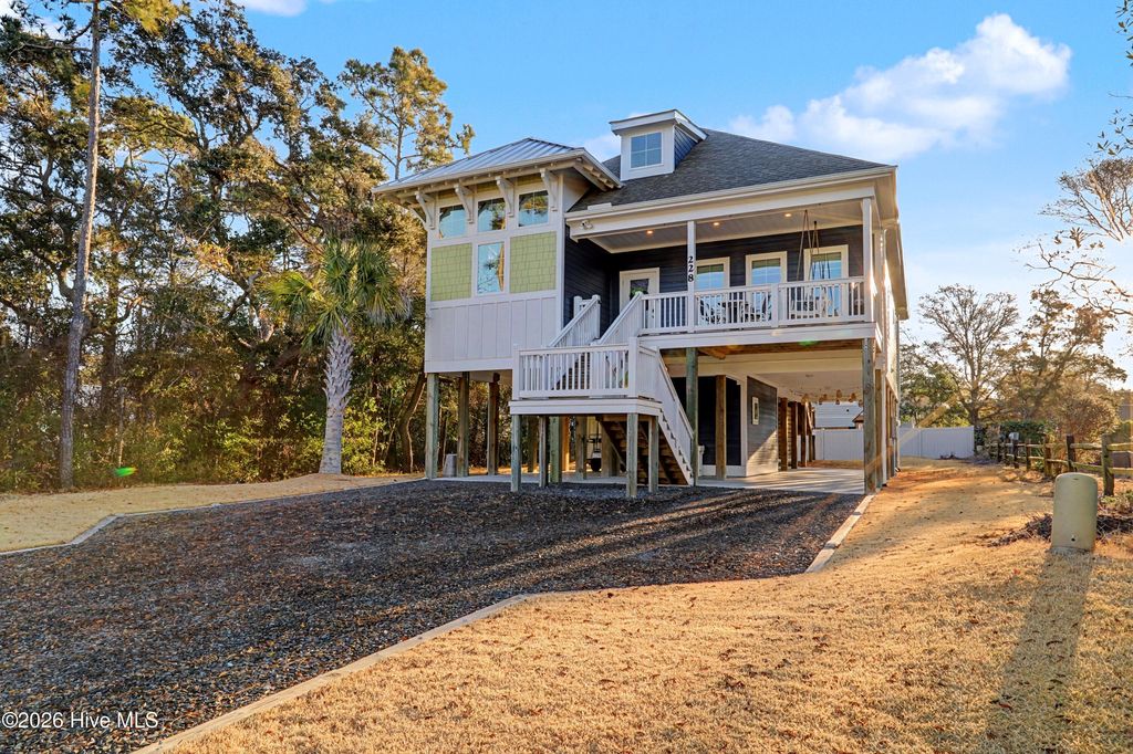 Photo of 228 NE 41st Street, Oak Island, NC 28465 (MLS # 100555337)