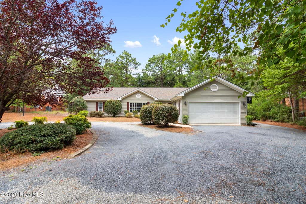 Photo of 173 Pine Lake Drive, Whispering Pines, NC 28327 (MLS # 100594107)