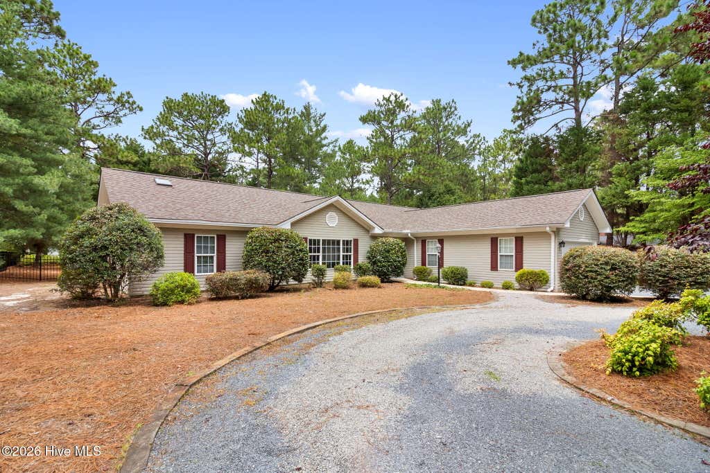 Photo of 173 Pine Lake Drive, Whispering Pines, NC 28327 (MLS # 100594107)