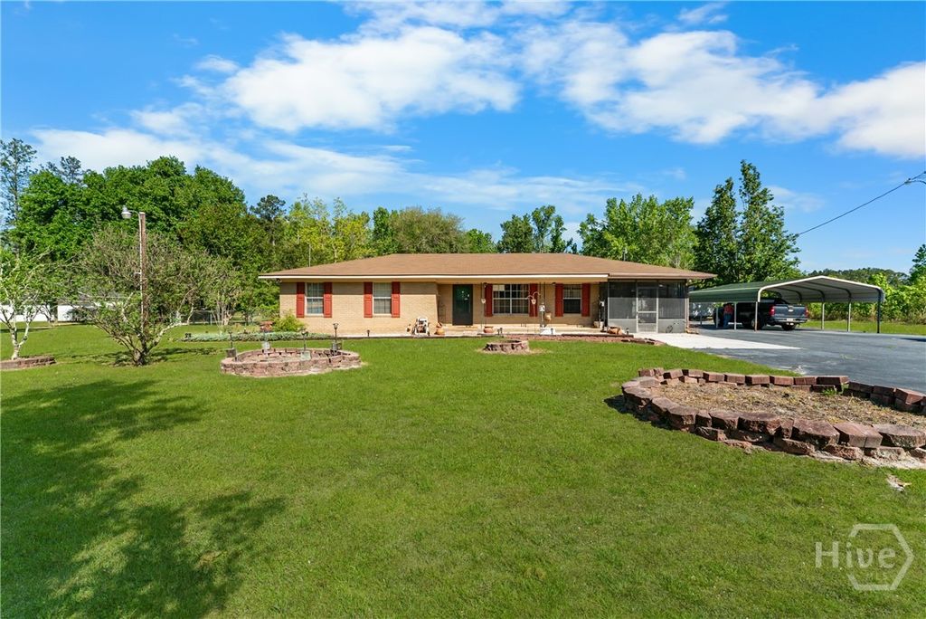 Photo of 673 Ga Highway 119 N, Ellabell, GA 31308 (MLS # SA353556)