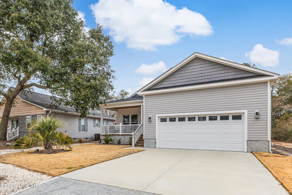 Photo of 304 E Oak Island Drive, Oak Island, NC 28465 (MLS # 100554895)