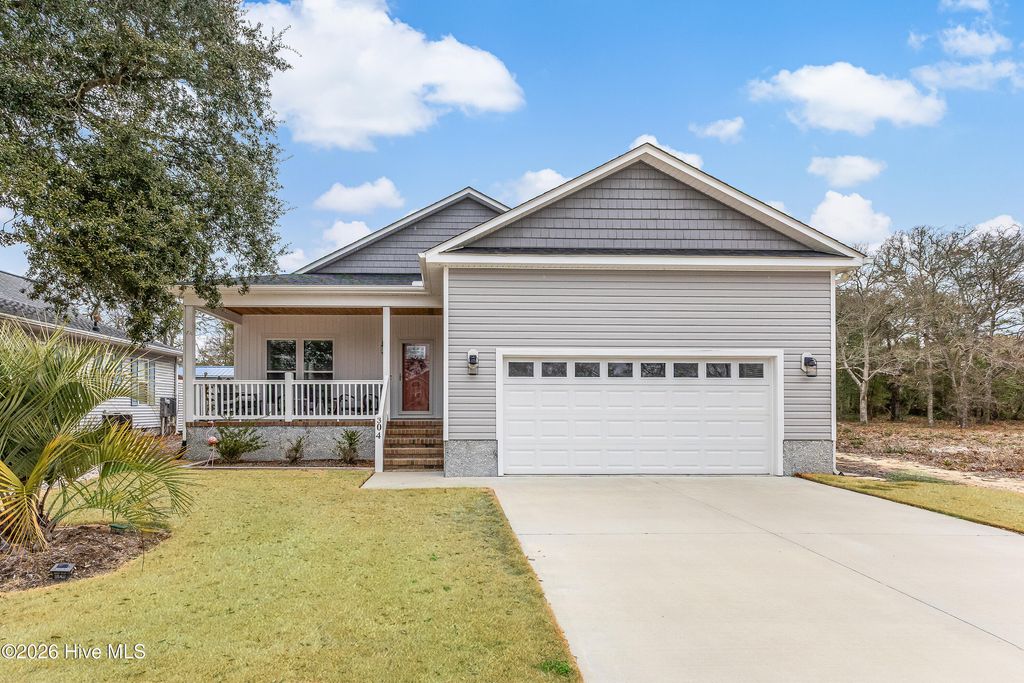 Photo of 304 E Oak Island Drive, Oak Island, NC 28465 (MLS # 100554895)