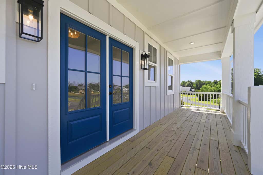Photo of 611 Moss Lake Lane, Holly Ridge, NC 28445 (MLS # 100584763)