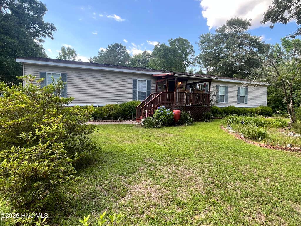 Photo of 1419 Tom Sessions Road, Whiteville, NC 28472 (MLS # 100584332)