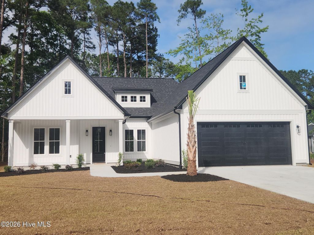 Photo of 406 Sandlewood Drive NW, Calabash, NC 28467 (MLS # 100576178)