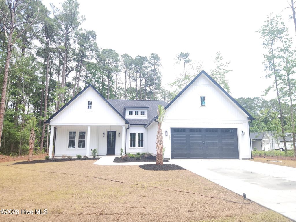Photo of 406 Sandlewood Drive NW, Calabash, NC 28467 (MLS # 100576178)