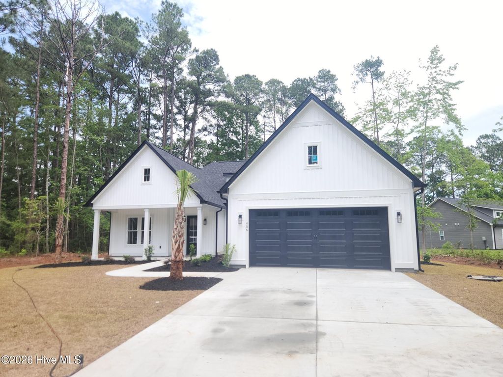 Photo of 406 Sandlewood Drive NW, Calabash, NC 28467 (MLS # 100576178)