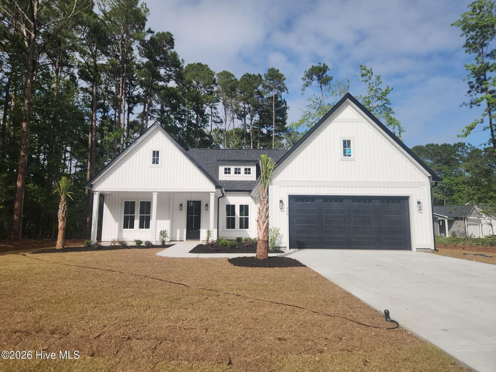 Photo of 406 Sandlewood Drive NW, Calabash, NC 28467 (MLS # 100576178)