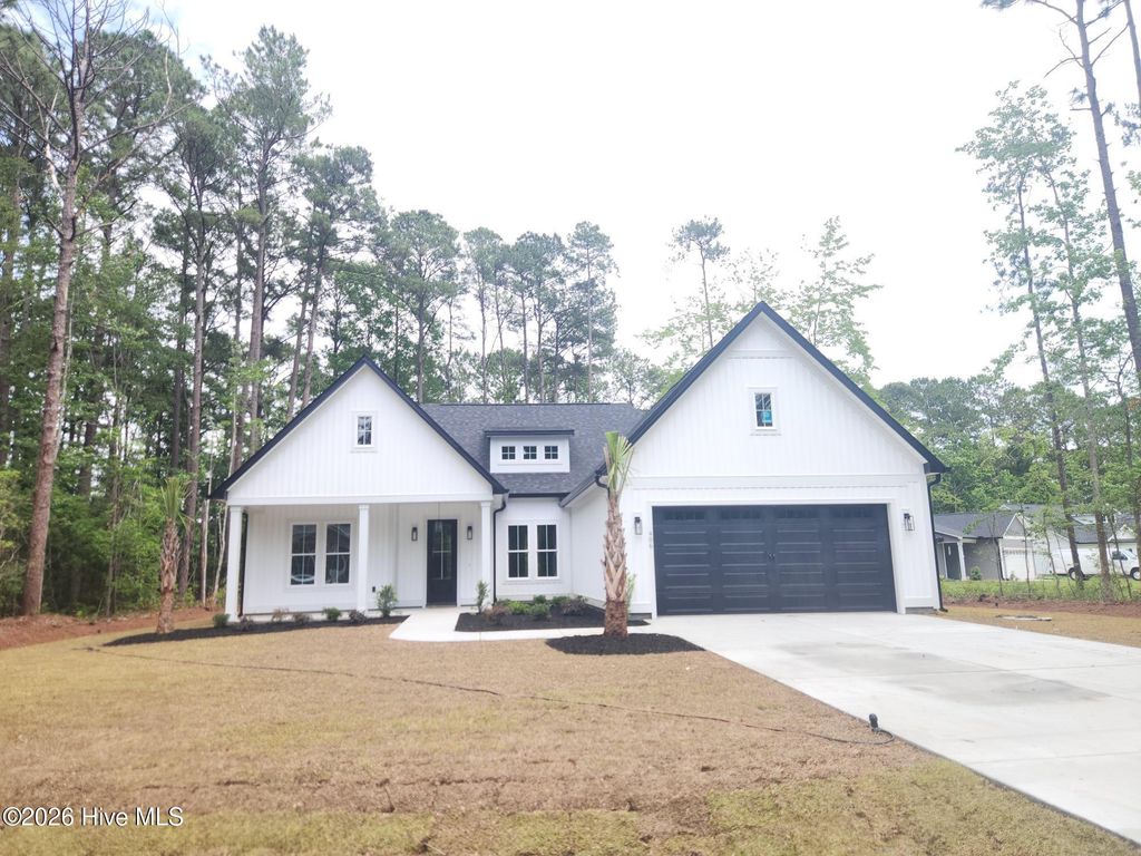Photo of 406 Sandlewood Drive NW, Calabash, NC 28467 (MLS # 100576178)