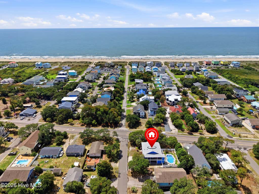 Photo of 7008 E Oak Island Drive, Oak Island, NC 28465 (MLS # 100596486)