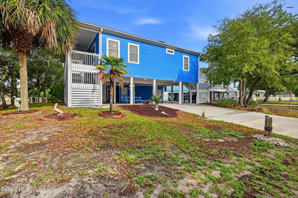 Photo of 7008 E Oak Island Drive, Oak Island, NC 28465 (MLS # 100596486)