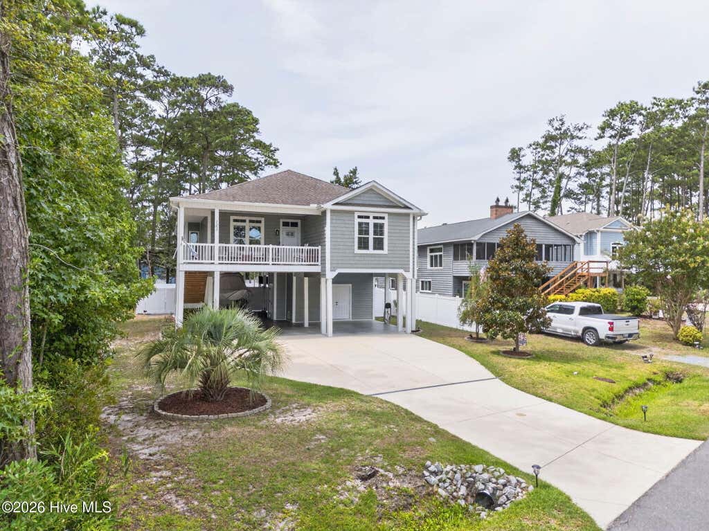 Photo of 2303 W Yacht Drive, Oak Island, NC 28465 (MLS # 100590911)
