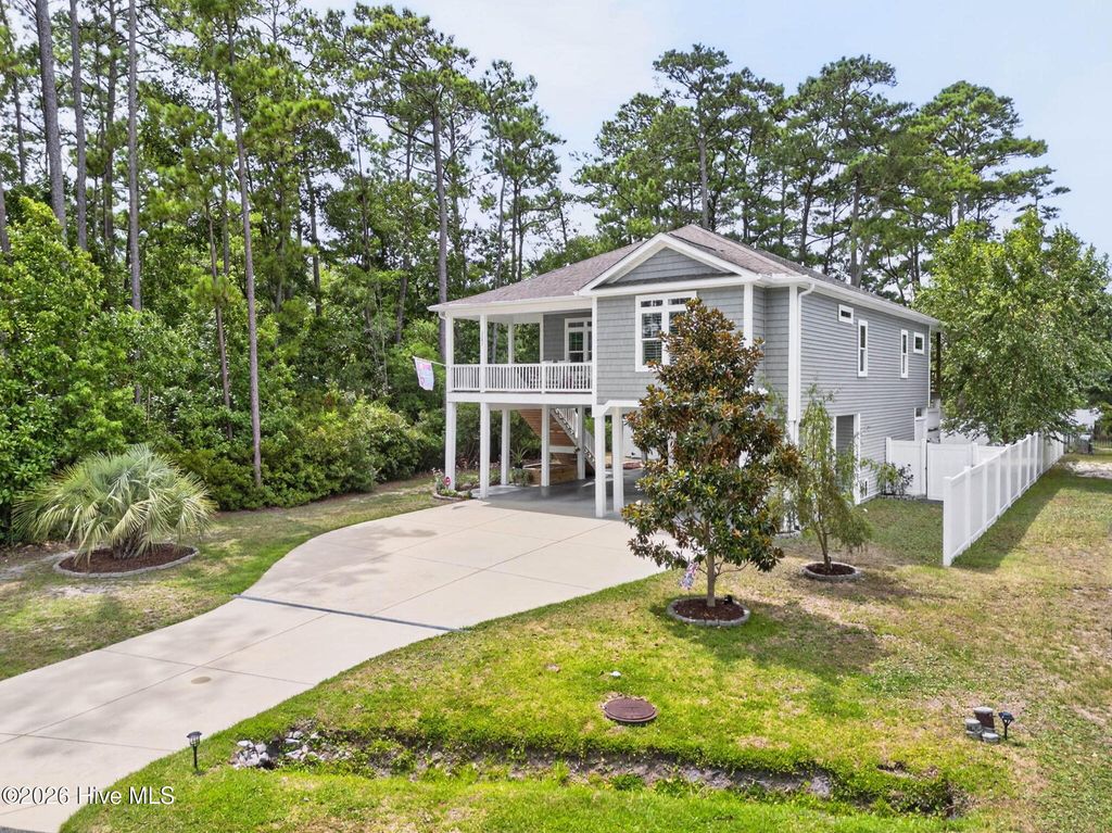 Photo of 2303 W Yacht Drive, Oak Island, NC 28465 (MLS # 100590911)