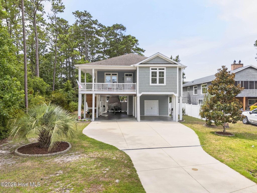 Photo of 2303 W Yacht Drive, Oak Island, NC 28465 (MLS # 100590911)