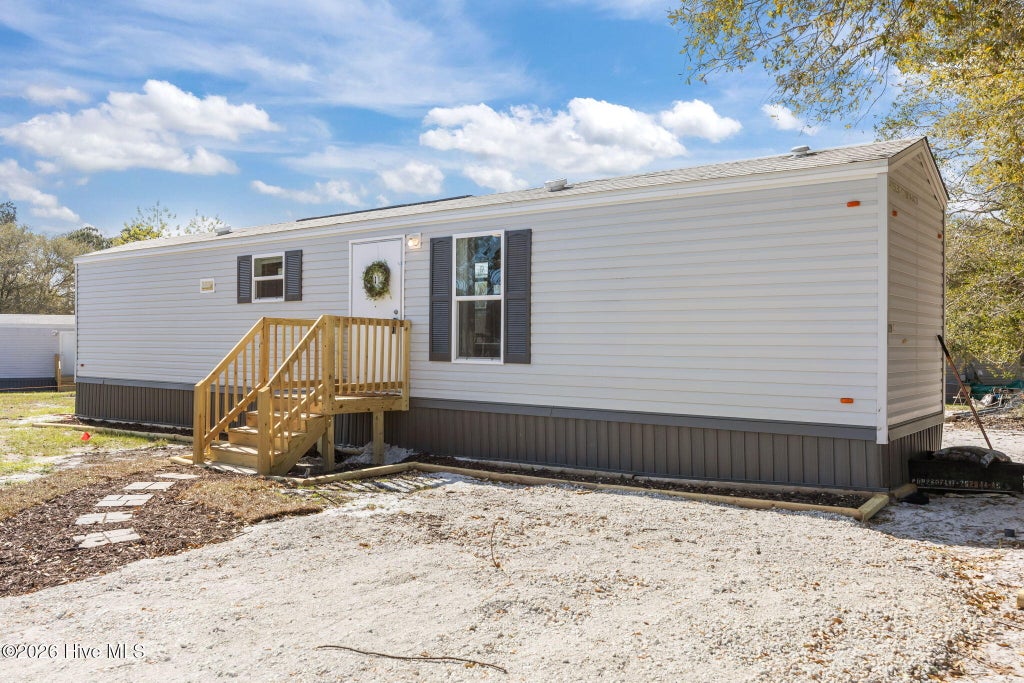 Photo of 111 Woodpecker Road, Holly Ridge, NC 28445 (MLS # 100608843)