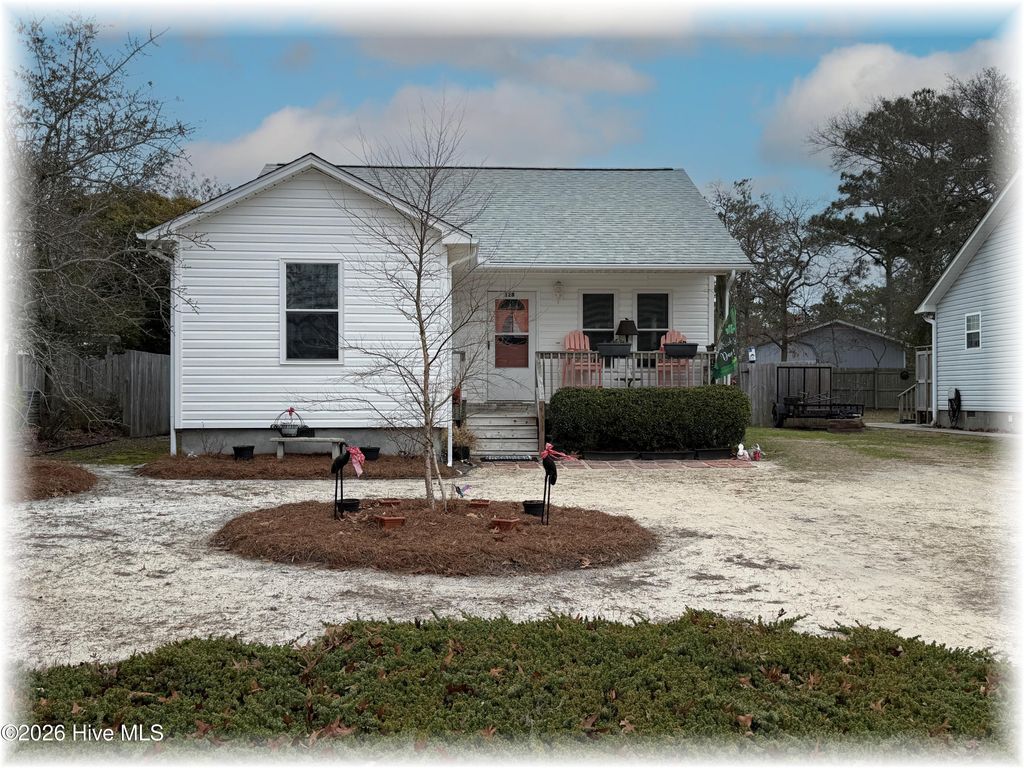 Photo of 128 NW 12th Street, Oak Island, NC 28465 (MLS # 100558019)