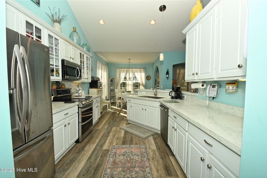 Photo of 465 Slippery Rock Way, Carolina Shores, NC 28467 (MLS # 100541261)