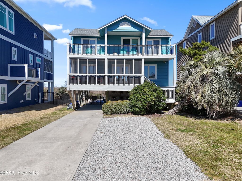 Photo of 108 Caswell Beach Road, Oak Island, NC 28465 (MLS # 100494024)