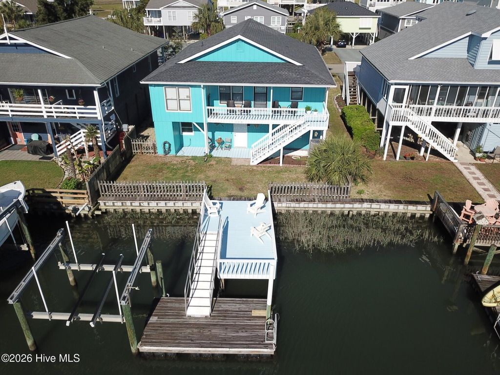 Photo of 128 Tarpon Drive, Holden Beach, NC 28462 (MLS # 100571769)
