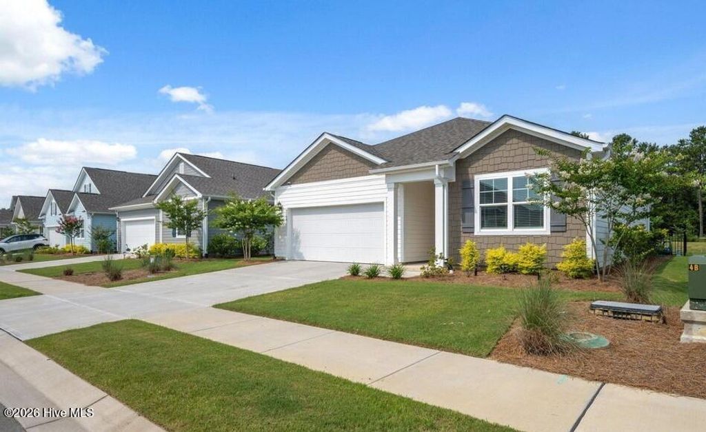 Photo of 7148 Foxhollow Lane, Leland, NC 28451 (MLS # 100548554)