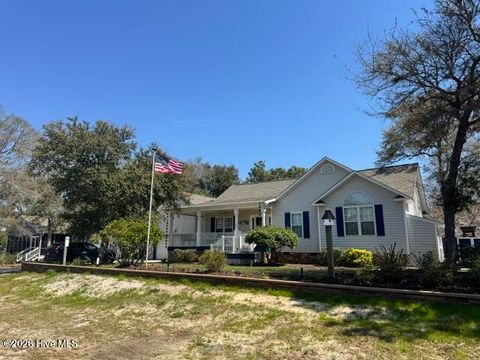 Photo of 144 NW 11th Street, Oak Island, NC 28465 (MLS # 100562139)