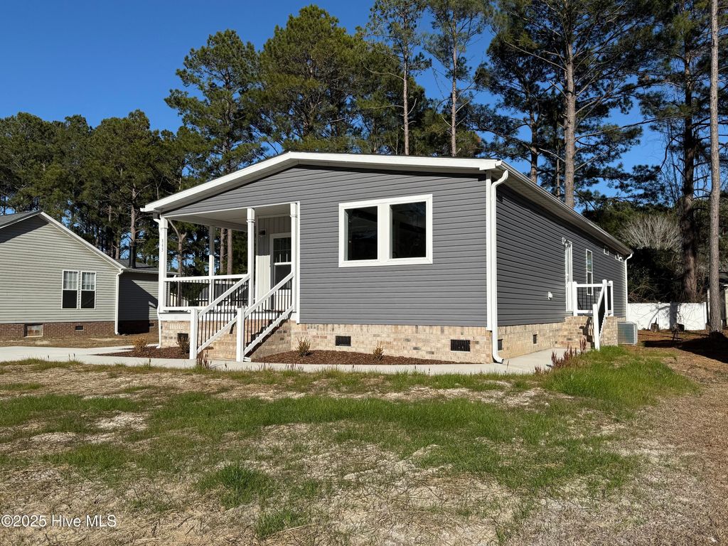 Photo of 845 Watson Avenue SW, Calabash, NC 28467 (MLS # 100558282)