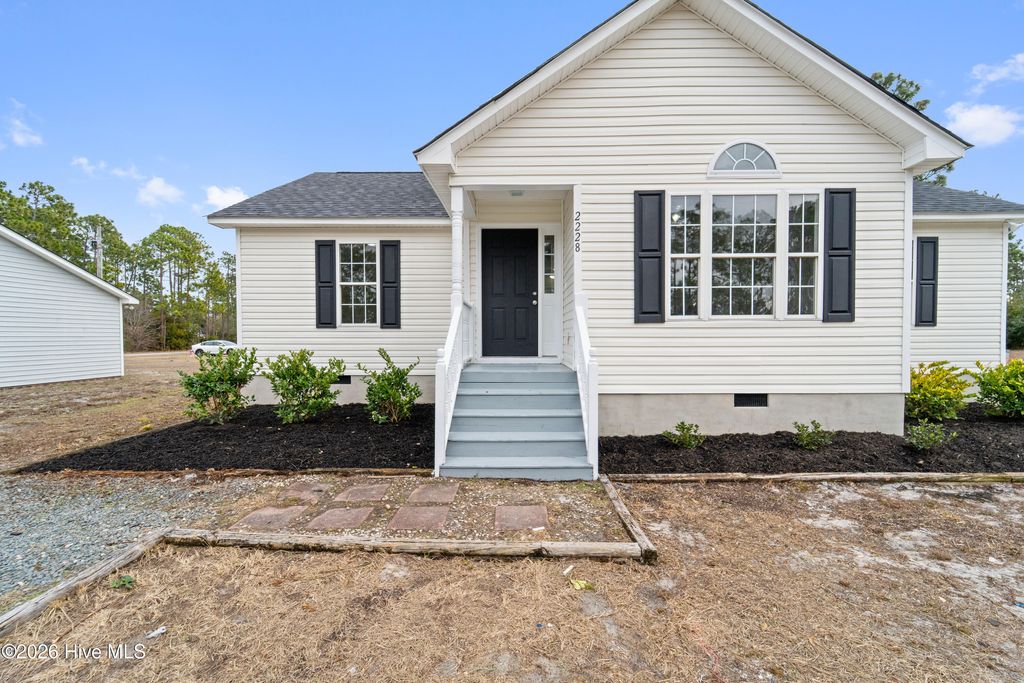 Photo of 2228 E Boiling Spring Road, Southport, NC 28461 (MLS # 100551599)