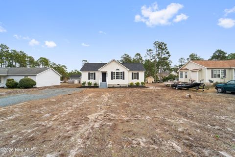 Photo of 2228 E Boiling Spring Road, Southport, NC 28461 (MLS # 100551599)