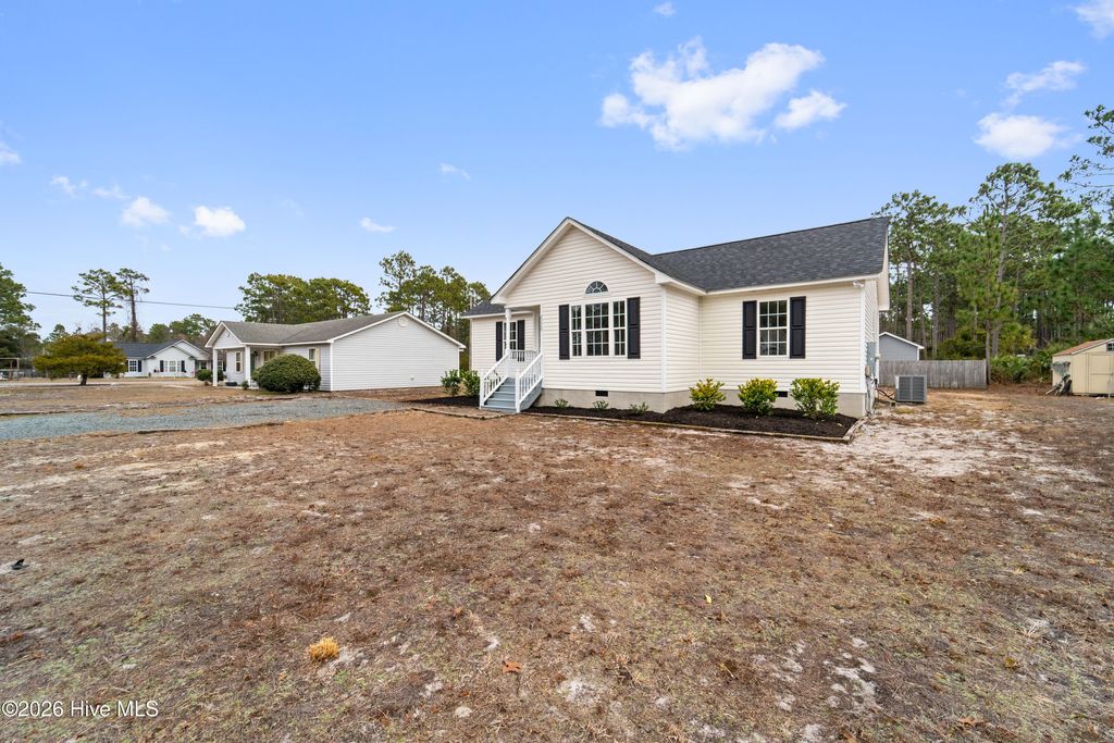 Photo of 2228 E Boiling Spring Road, Southport, NC 28461 (MLS # 100551599)