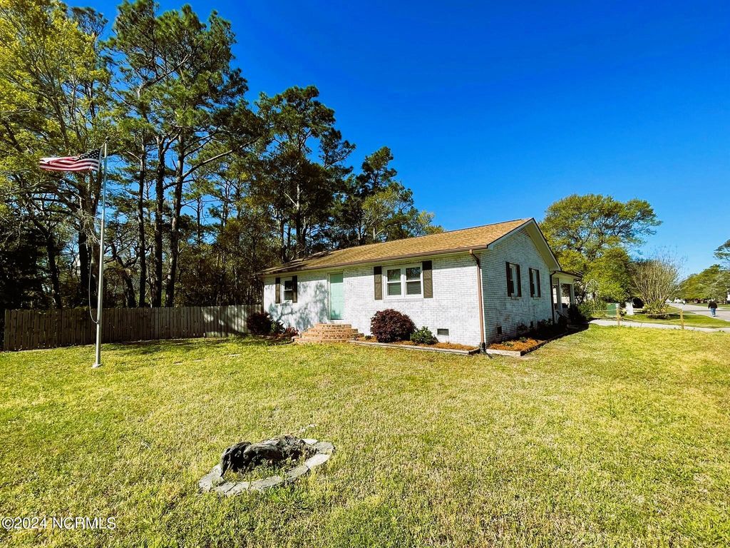 Photo of 113 NE 57th Street, Oak Island, NC 28465 (MLS # 100551209)