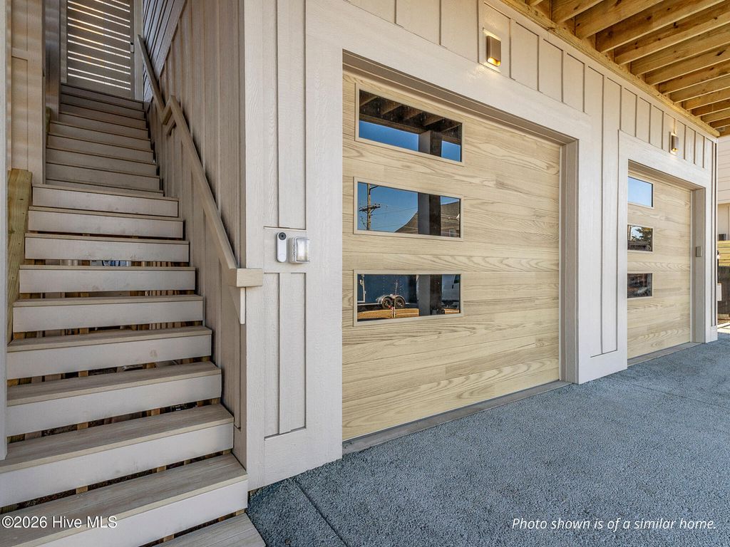 Photo of 608 S Topsail Drive, Surf City, NC 28445 (MLS # 100552191)