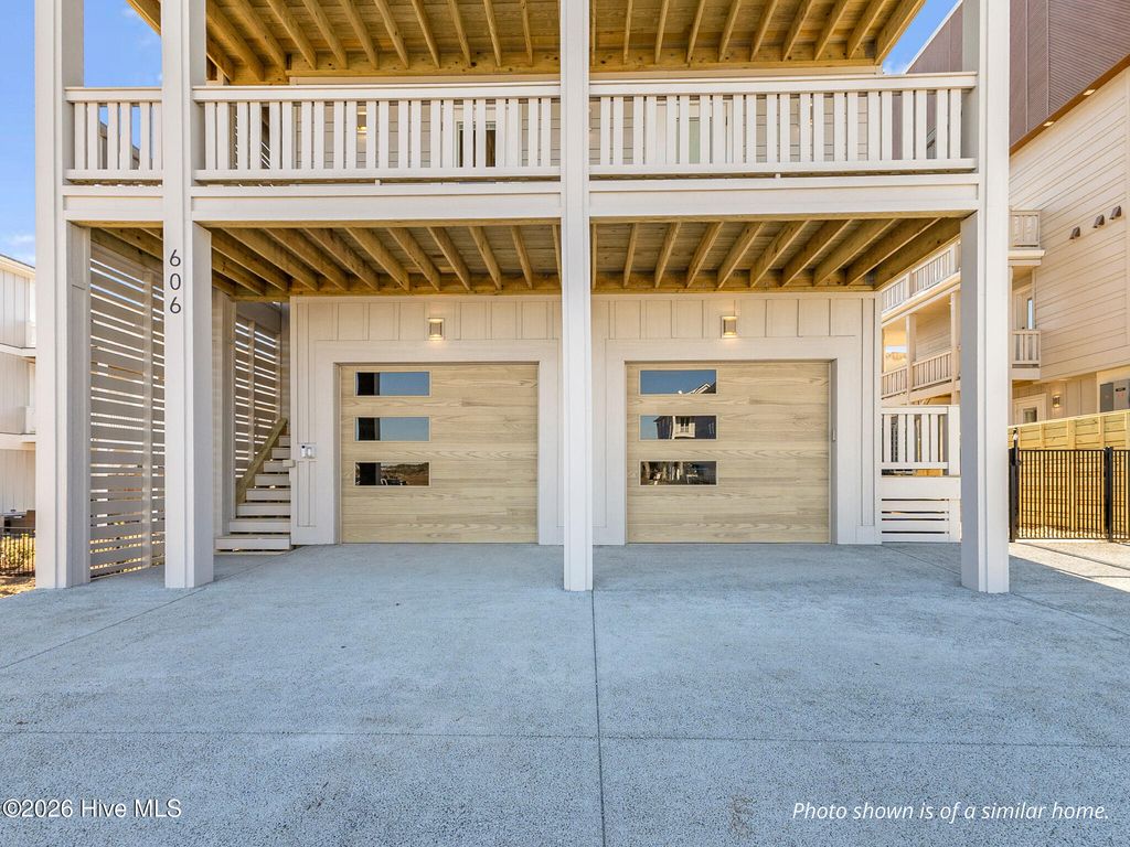 Photo of 608 S Topsail Drive, Surf City, NC 28445 (MLS # 100552191)