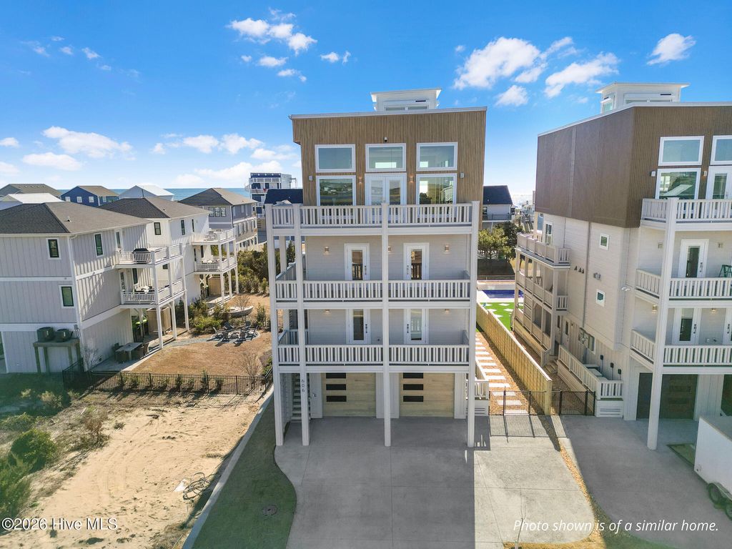 Photo of 608 S Topsail Drive, Surf City, NC 28445 (MLS # 100552191)